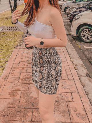 White top and snake skin skirt