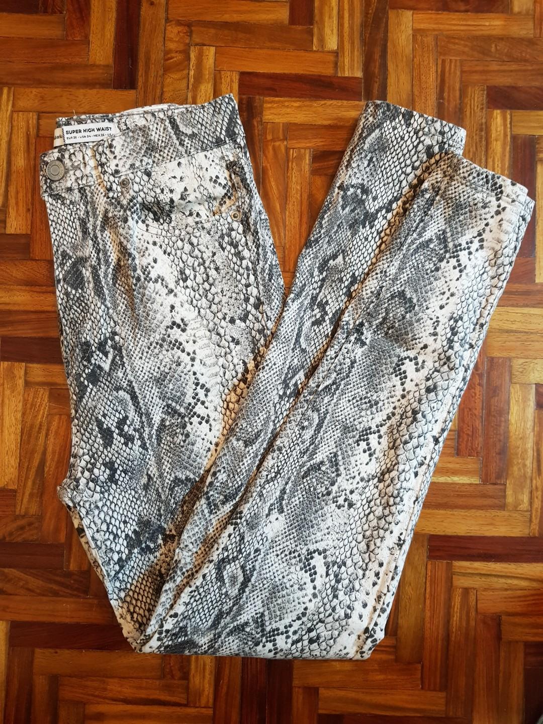 Stradivarius super high waist white jeans (Category: Jeans) located in Quezon City. Submitted by letsraidclosets (Listing ID 266810232, Image 1). Description: Brand new tags removed. Never used. Wrong size.
