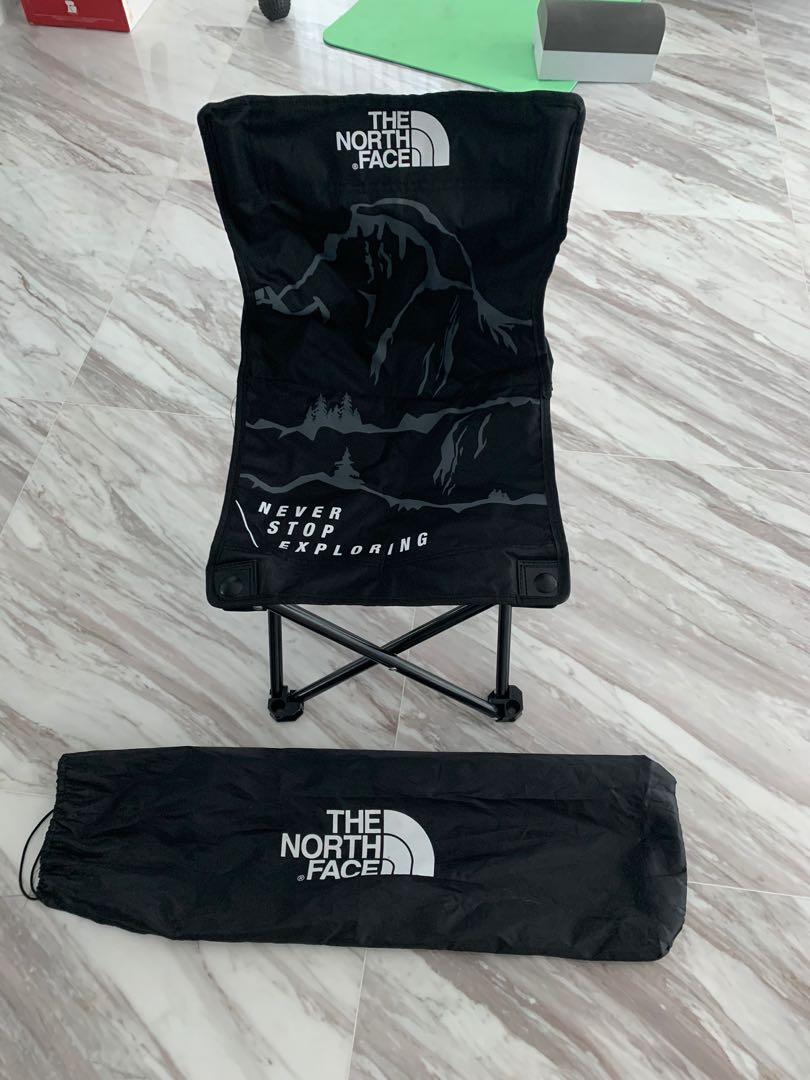 The North Face foldable camping chair, Everything Else on Carousell