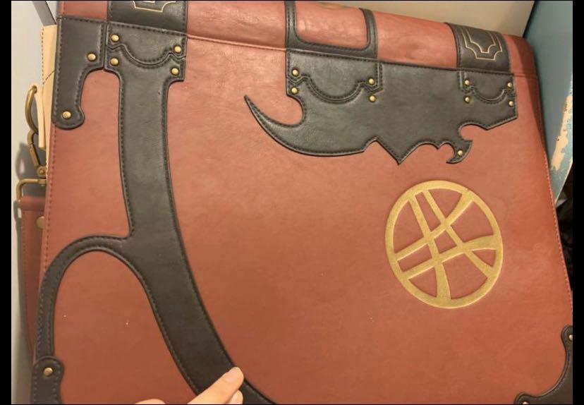 Book of vishanti messenger bag top