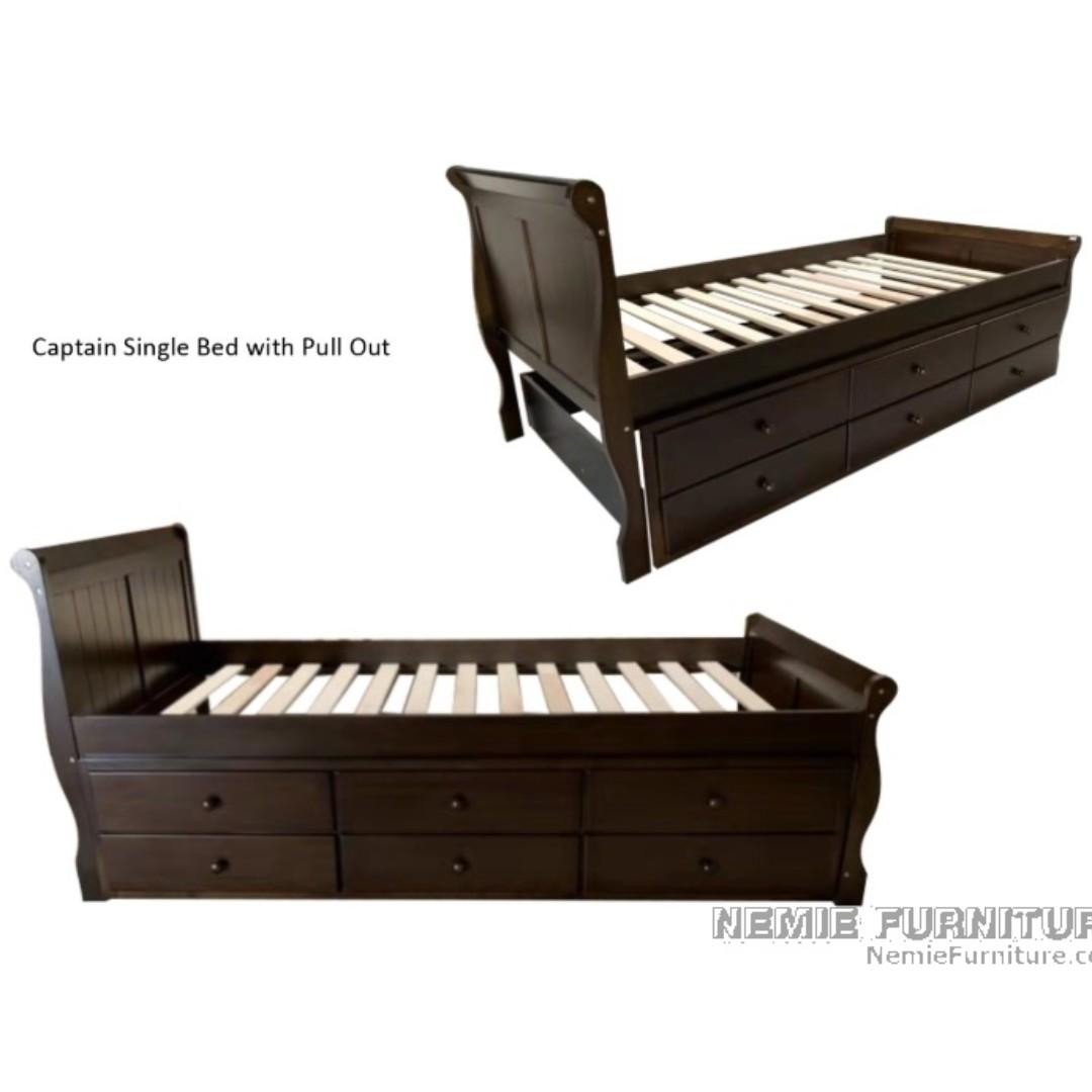 CAPTAIN HF single bed frame with pullout (Category: Bed Frames & Mattresses) located in Quezon City. Submitted by nemiefurniture (Listing ID 267213072, Image 1). Description: single wooden bed frame with pullout for mattress 36" x 75" color: wenge.