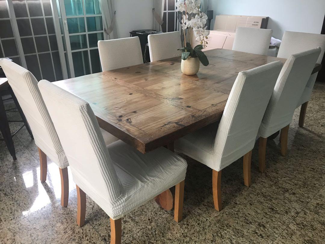 Dining Table (Category: Tables & Sets) located in Singapore. Submitted by jmp71 (Listing ID 267231681, Image 2). Description: Beautiful and solid wood. Some wood worn underneath from dog chewing. 8 Chairs in good condition. I have put covers on them otherwise it’s a red and white check material underneath. L = 220cm W = 120cm Collection only in January. .
