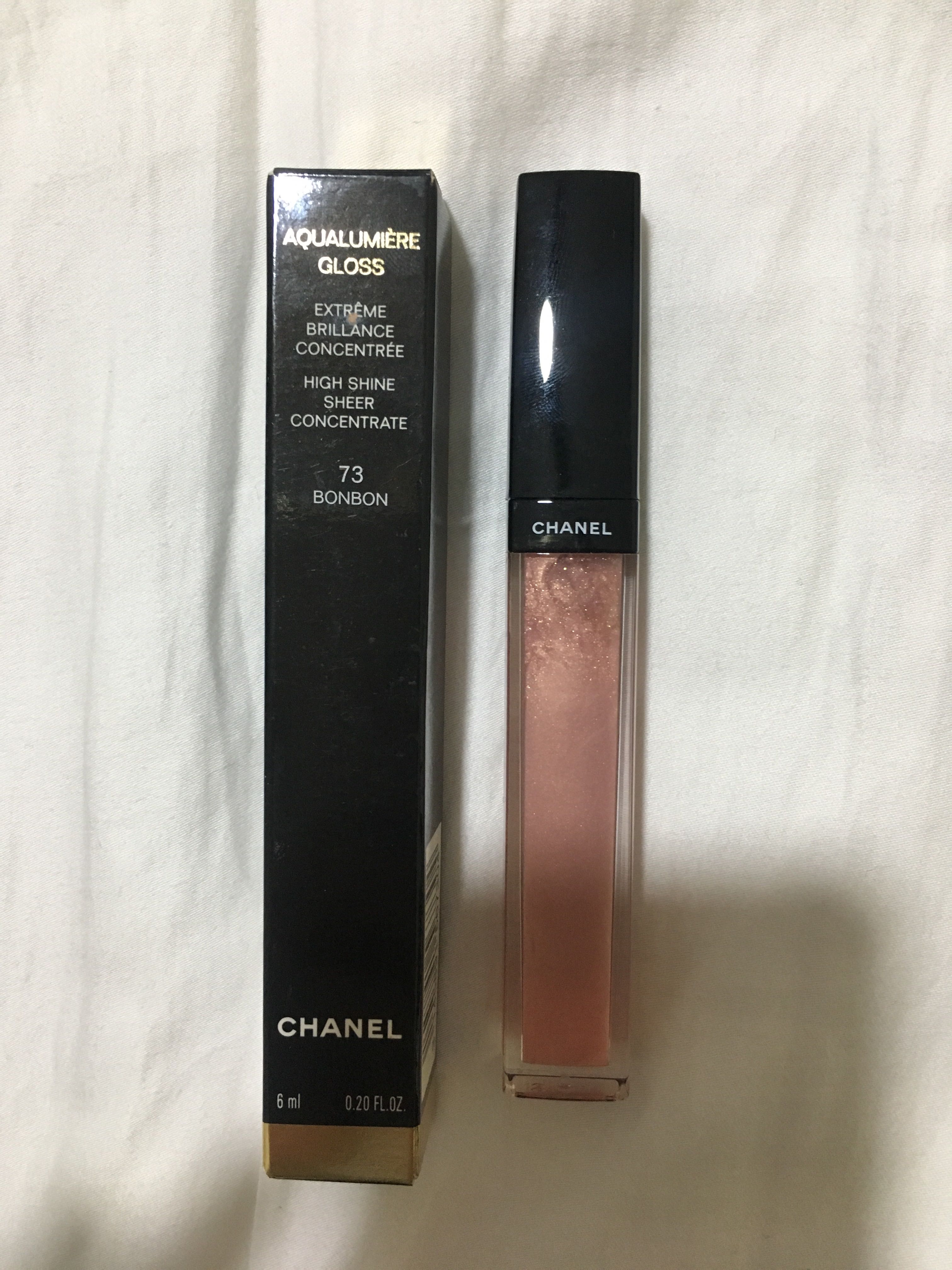 aqualumiere lip gloss high sheer concentrate 73 bon bon, Beauty & Personal Face, Makeup on Carousell