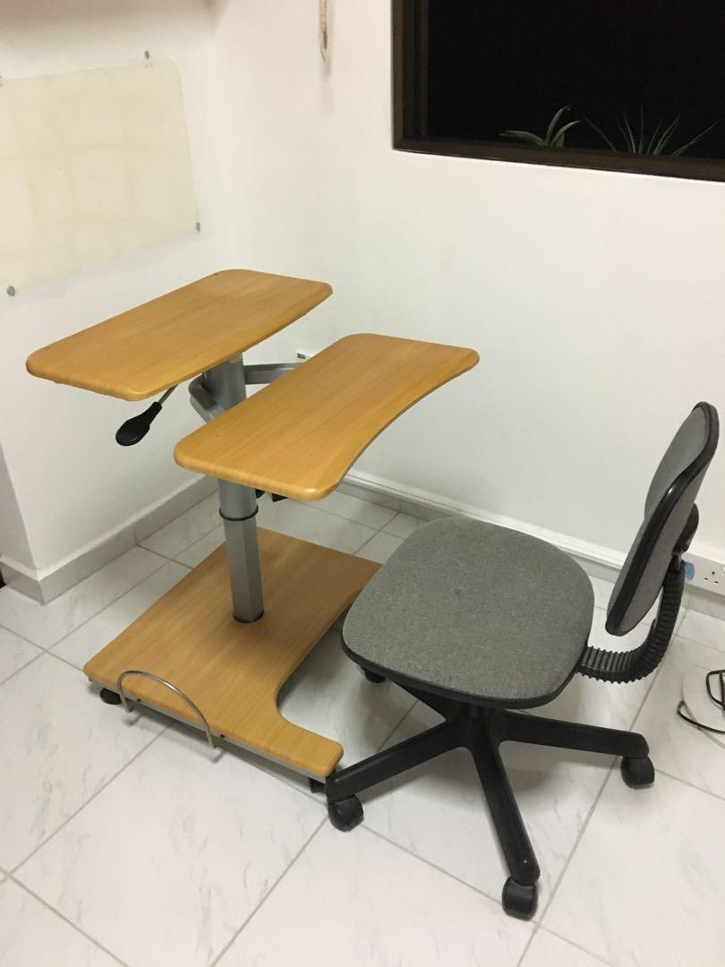 Work Table (Category: Tables & Sets) located in Singapore. Submitted by raagandbone (Listing ID 267344016, Image 1). Description: 2nd hand work table (chair not included), with swivel wheels and adjustable height. Condition 8/10. Giving way item for free, self collect in Serangoon area..