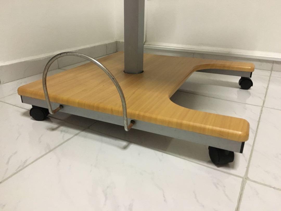 Work Table (Category: Tables & Sets) located in Singapore. Submitted by raagandbone (Listing ID 267344016, Image 3). Description: 2nd hand work table (chair not included), with swivel wheels and adjustable height. Condition 8/10. Giving way item for free, self collect in Serangoon area..