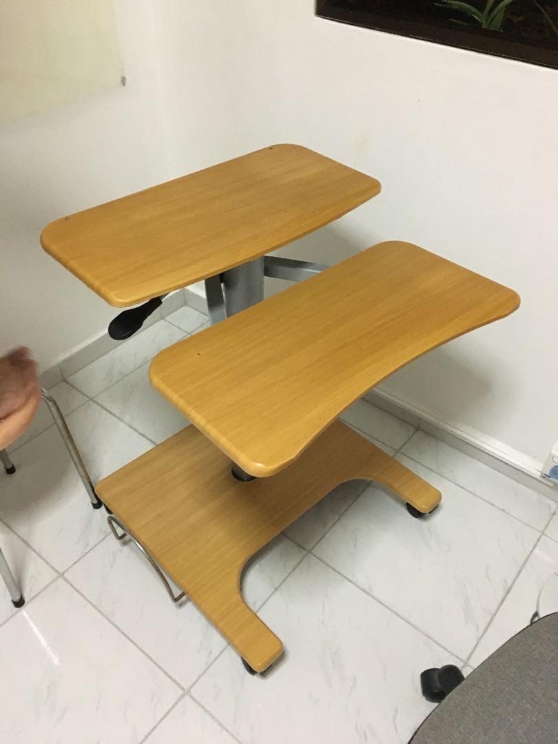 Work Table (Category: Tables & Sets) located in Singapore. Submitted by raagandbone (Listing ID 267344016, Image 2). Description: 2nd hand work table (chair not included), with swivel wheels and adjustable height. Condition 8/10. Giving way item for free, self collect in Serangoon area..