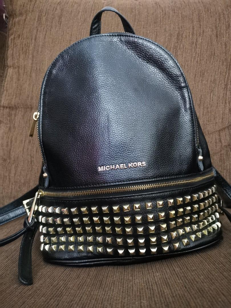 Authentic michael kors best sale backpack