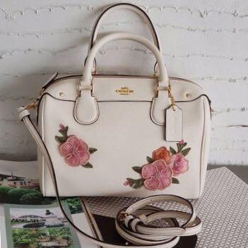 White coach bag with outlet flowers