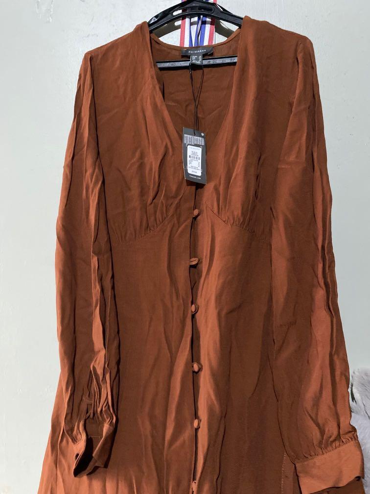 Primark Long sleeve brown maxi dress (Category: Dresses) located in Pasay City. Submitted by luxebox (Listing ID 267516530, Image 2). Description: Bought in London, but it’s really too small for me. 1 button gave up when I was trying, but easily repairable I saved it! Lol! .