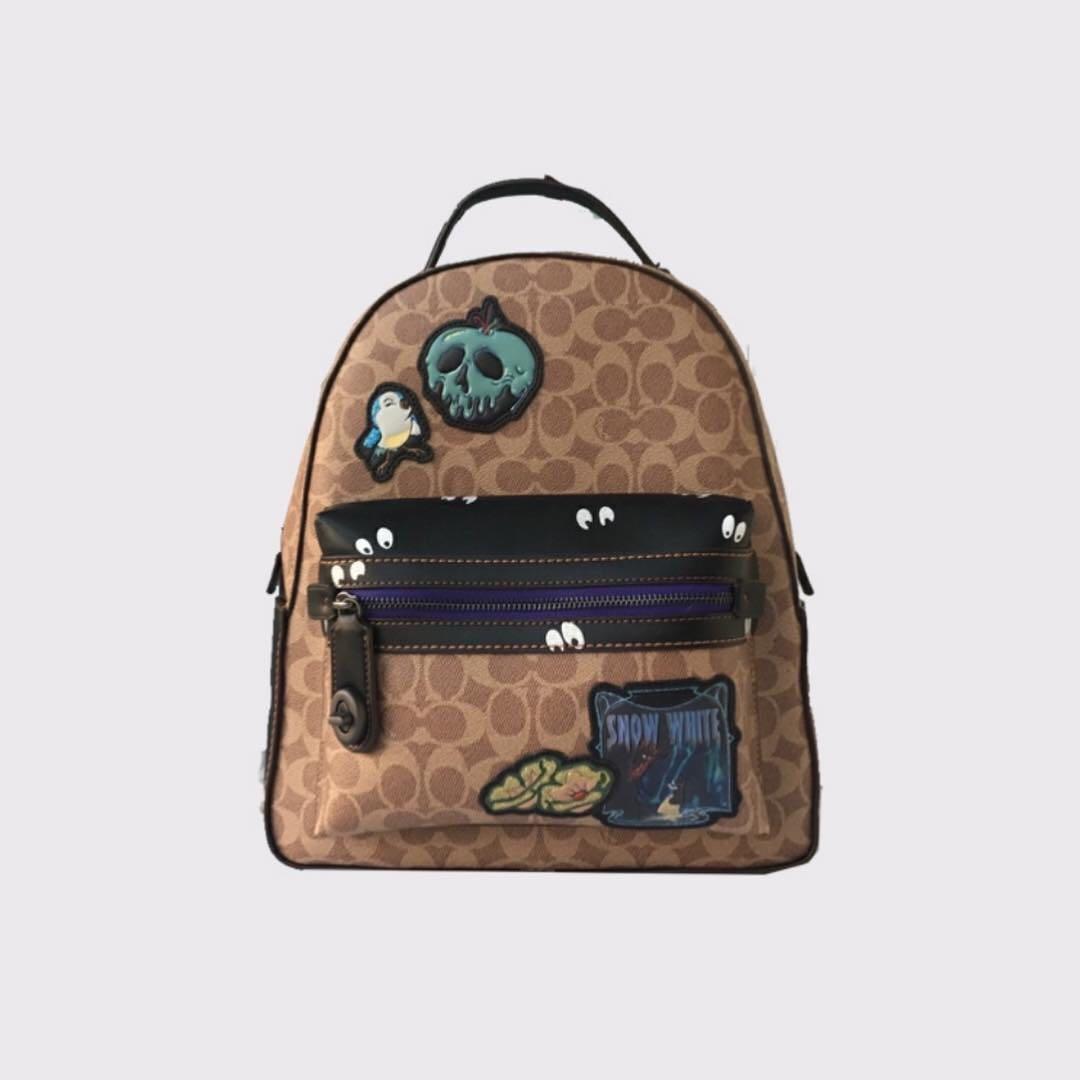 Disney x coach campus backpack 23 in signature patchwork discount