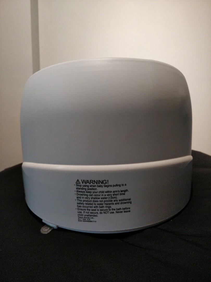 tesco karibu baby bath swivel seat unisex 360 rotation babies kids bathing changing bathtub bath accessories on carousell