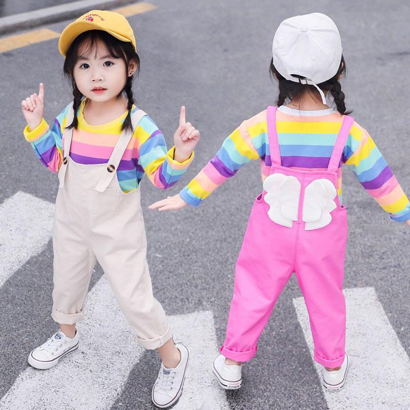 baby with suspenders