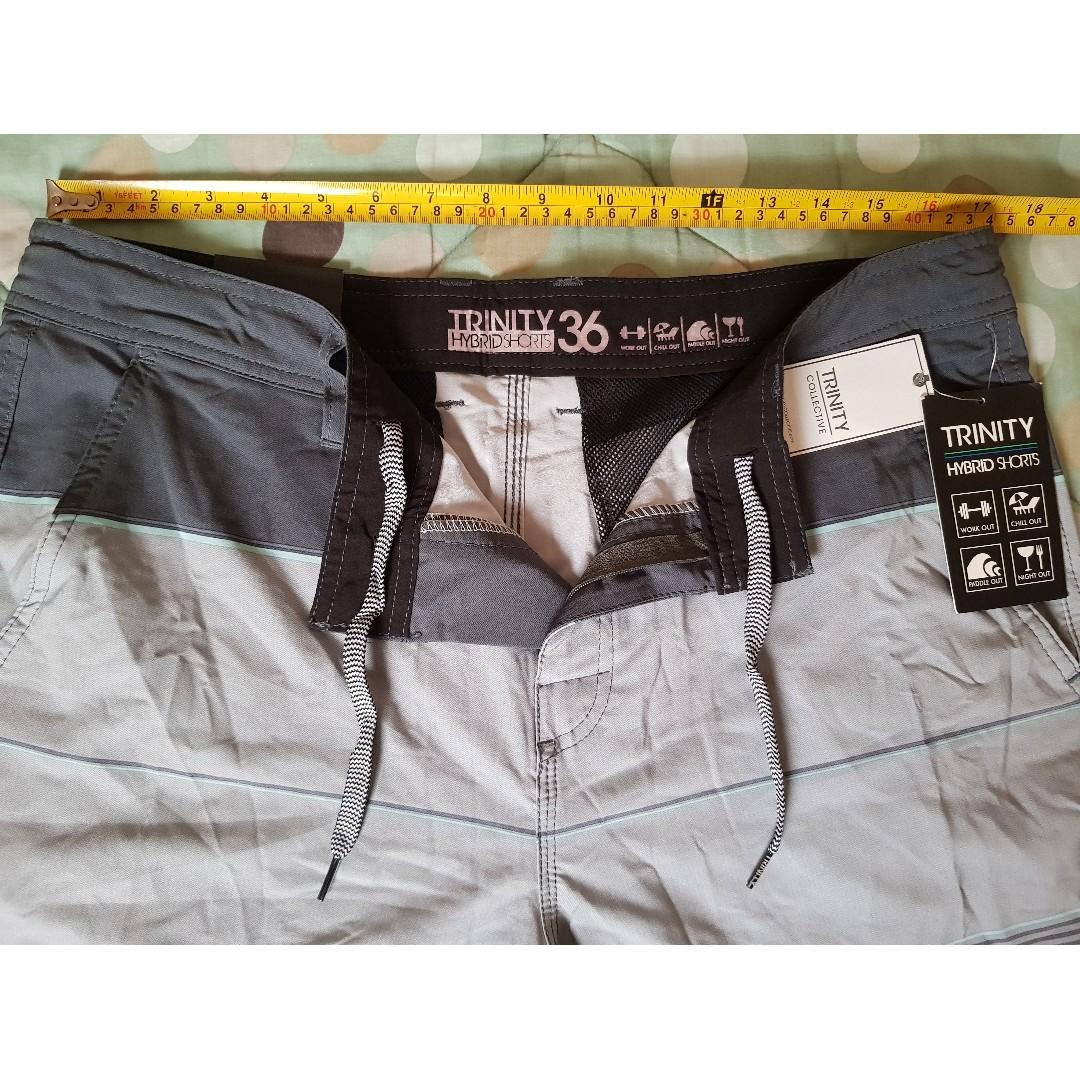 Board shorts sale Trinity Hybrid Shorts brand new with tags Men s Fashion Bottoms Swim Trunks Board Shorts on Carousell
