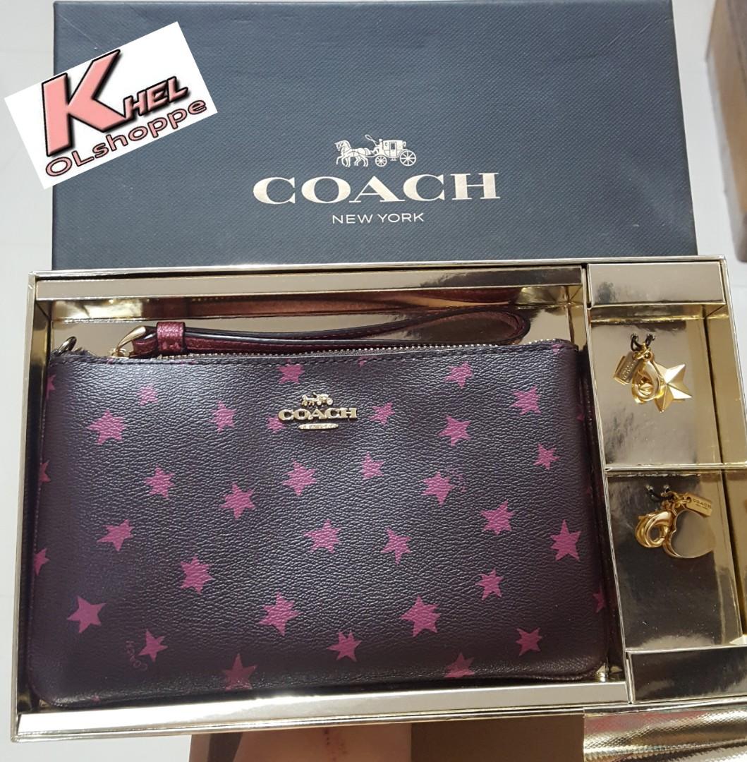 Coach wristlet sales with charms