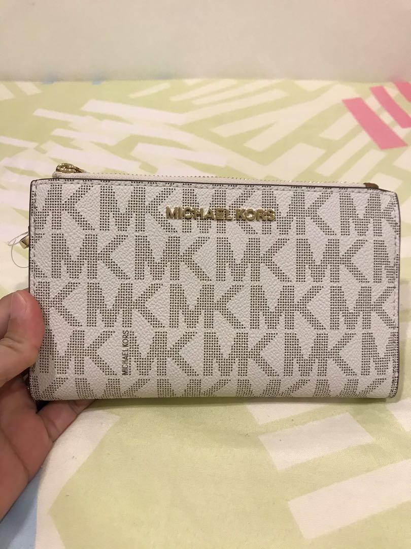 Mk adele double zip (Category: Purses & Pouches) located in Singapore. Submitted by gummybear0504 (Listing ID 268319077, Image 2). Description: .