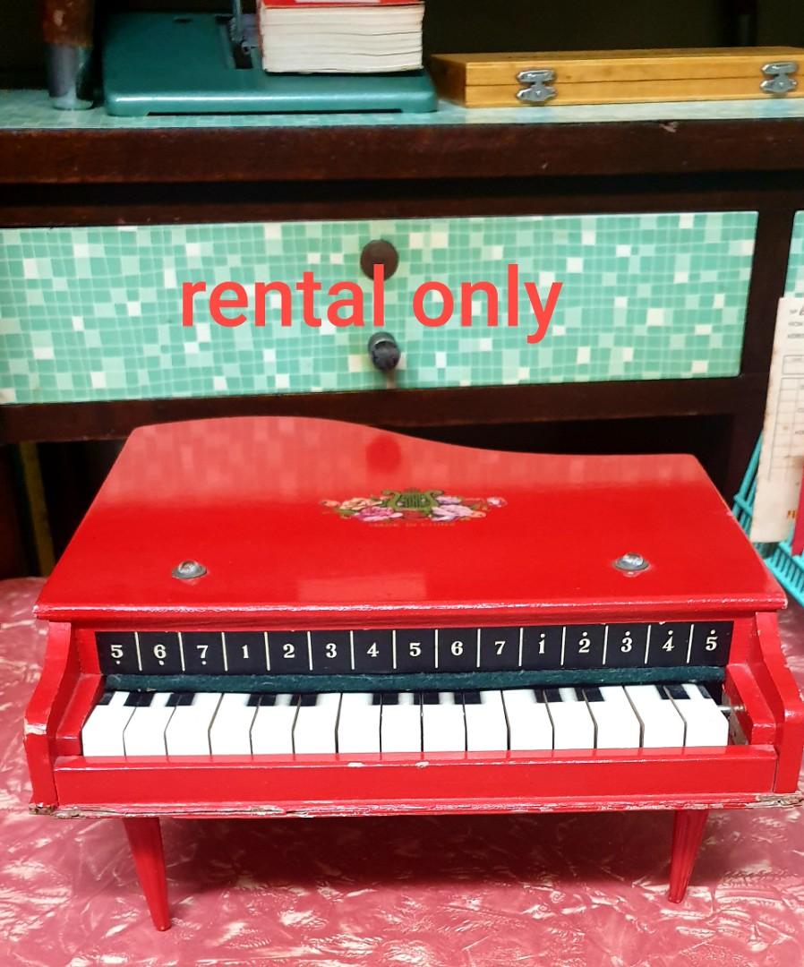 Vintage wooden toy piano rental only