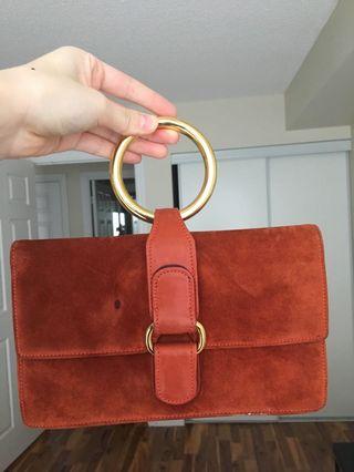 Vintage Gucci handbag, red suede with gold round handle