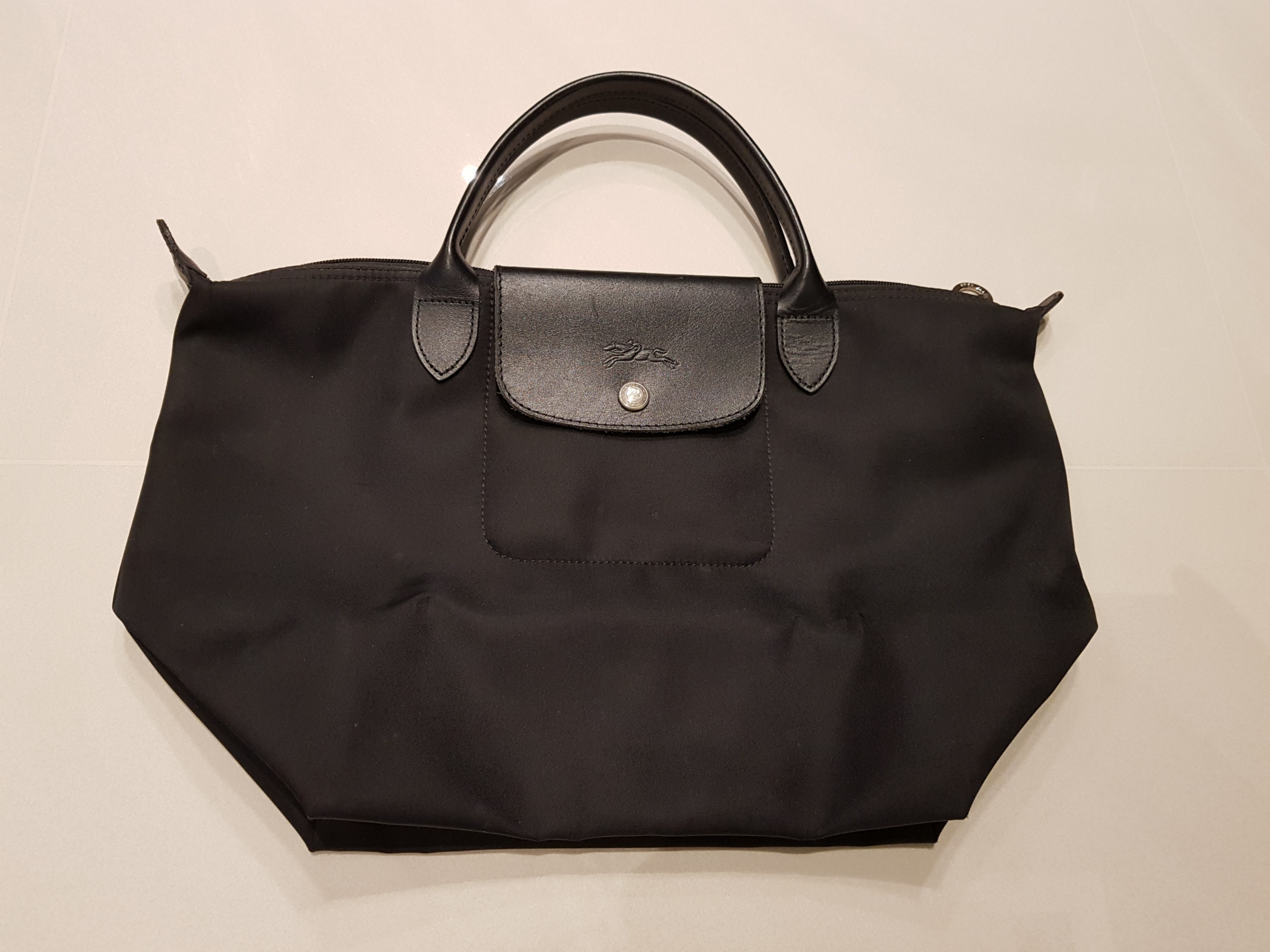 Longchamp depose handbag sales