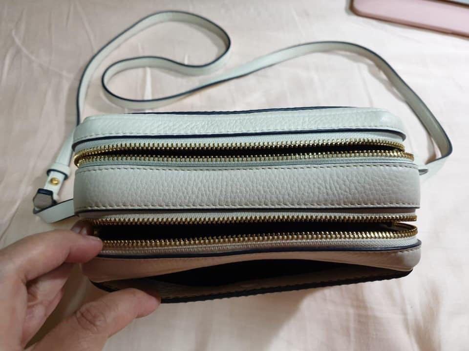 Preloved Tory Burch sling bag (Category: Cross-body Bags) located in Pasig City. Submitted by batchimallari (Listing ID 268506681, Image 2). Description: Preloved authentic Tory Burch sling bag 10/10 Bought for P20,000 Used less than 5x In mint condition .