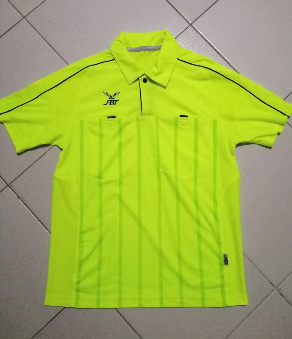 yellow referee shirt