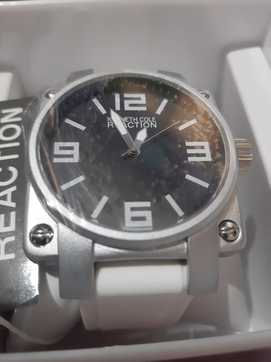Authentic Kenneth Cole Reaction Men's watch (Category: Men's Watches) located in Manila. Submitted by time07 (Listing ID 269185097, Image 2). Description: Authentic and original Kenneth Cole Reaction White Silicone Men's watch. Brand new, never been used, protective covers on the front and back are still intact. Model # RK1307. Research is encouraged. Fits wrists up to 8 inches Dial window material type : Hesalite Display Type : Analog Case mater