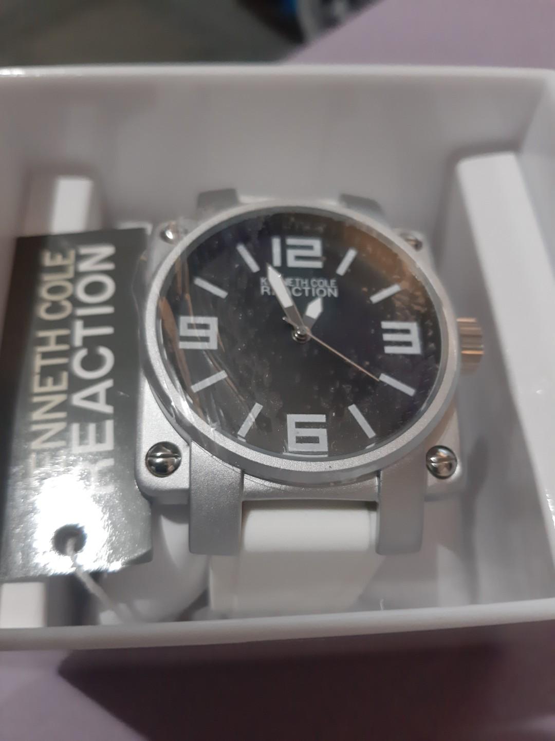 Authentic Kenneth Cole Reaction Men's watch (Category: Men's Watches) located in Manila. Submitted by time07 (Listing ID 269185097, Image 1). Description: Authentic and original Kenneth Cole Reaction White Silicone Men's watch. Brand new, never been used, protective covers on the front and back are still intact. Model # RK1307. Research is encouraged. Fits wrists up to 8 inches Dial window material type : Hesalite Display Type : Analog Case mater