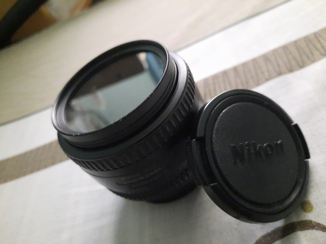 Nikon D7000 with 18-105mm lens and 50mm 1.8D lens AF