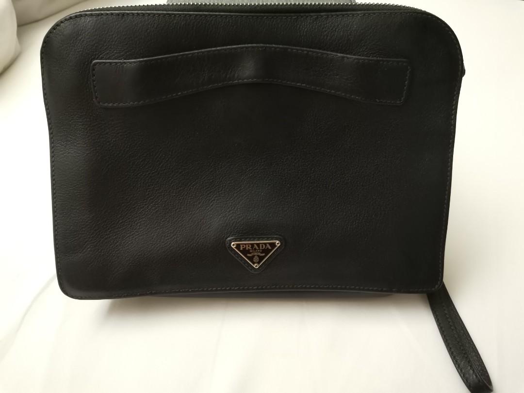 Prada Vitello City Nero Men's clutch (Category: Belt bags, Clutches and Pouches) located in Makati City. Submitted by viper353 (Listing ID 269280289, Image 1). Description: Prada Vitello City Nero Men's clutch Used, with signs of usage (strap front part). Check photos for more details. Complete with authenticity cards. Slightly negotiable, open for trades. Can trade to Nike AF1 Airforce 1 x Off white mid Black plus cash. Preferably pick up. If sh