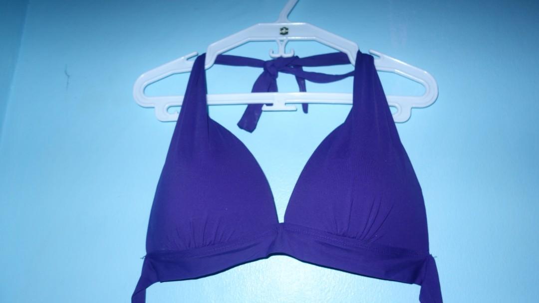 Purple Bikini Top (Size 12, XL, Cup C&D) (Category: Bikinis & Swimsuits) located in Pasig City. Submitted by jisuzieshop (Listing ID 269399814, Image 1). Description: Never used it. I have way bigger boobs and although this fits me okay, it's not as flattering as my side boob keeps popping out. Too graphic? Buy it please. Char. I'm a size 42D. Maybe a little smaller now. But this might suit another well-endowed woman. +SF +₱50 meet-up.