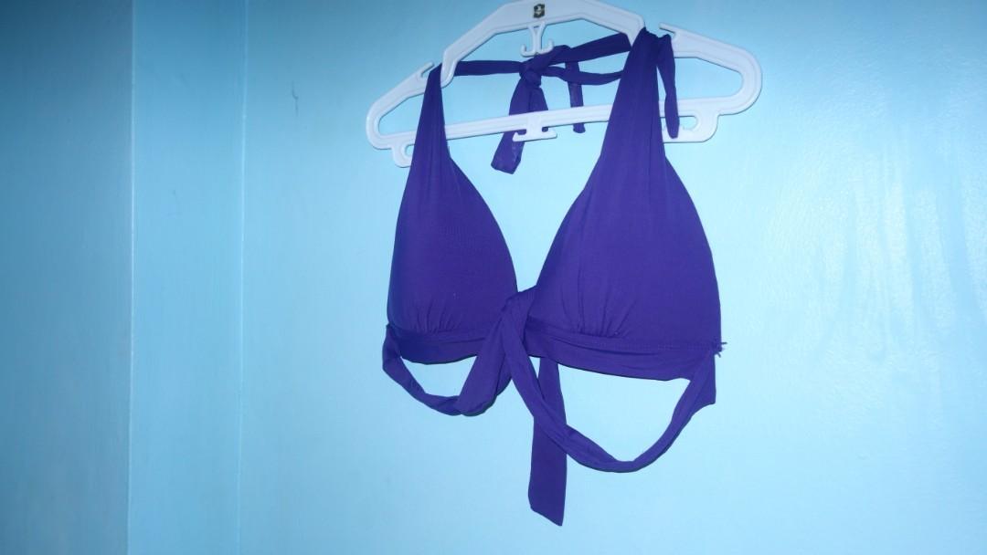Purple Bikini Top (Size 12, XL, Cup C&D) (Category: Bikinis & Swimsuits) located in Pasig City. Submitted by jisuzieshop (Listing ID 269399814, Image 3). Description: Never used it. I have way bigger boobs and although this fits me okay, it's not as flattering as my side boob keeps popping out. Too graphic? Buy it please. Char. I'm a size 42D. Maybe a little smaller now. But this might suit another well-endowed woman. +SF +₱50 meet-up.