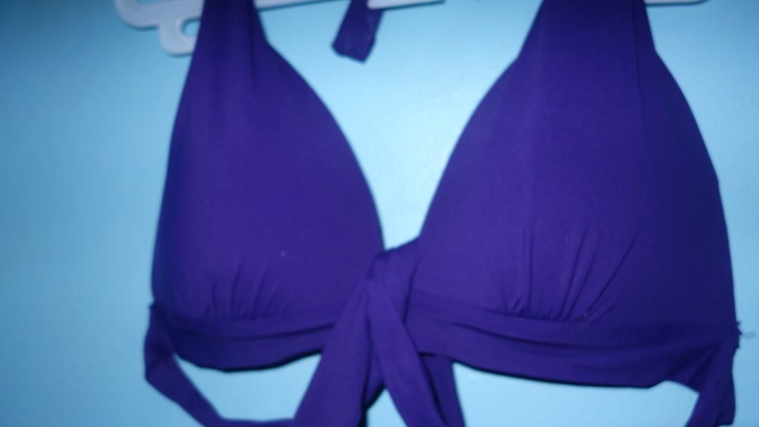Purple Bikini Top (Size 12, XL, Cup C&D) (Category: Bikinis & Swimsuits) located in Pasig City. Submitted by jisuzieshop (Listing ID 269399814, Image 2). Description: Never used it. I have way bigger boobs and although this fits me okay, it's not as flattering as my side boob keeps popping out. Too graphic? Buy it please. Char. I'm a size 42D. Maybe a little smaller now. But this might suit another well-endowed woman. +SF +₱50 meet-up.