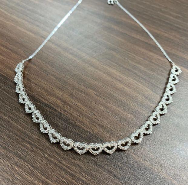 Heartshaped studded choker necklace with 14K extender (Category: Necklaces) located in Paranaque City. Submitted by jdtdd (Listing ID 269697473, Image 1). Description: Studded heartshaped choker HK setting total karats is 2.5 total grams is 11.2 Chain is 14K heart chain is 18K.