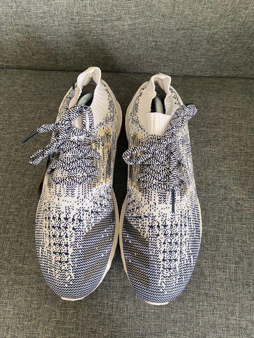 Ultra boost uncaged top oreo on feet