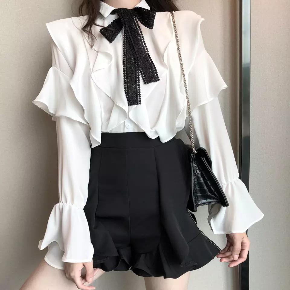 black long sleeve shirt with ruffles