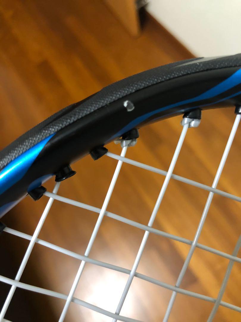 Yonex EZONE DR 98 (Blue) (1/4 grip with leather) with a set of grommets