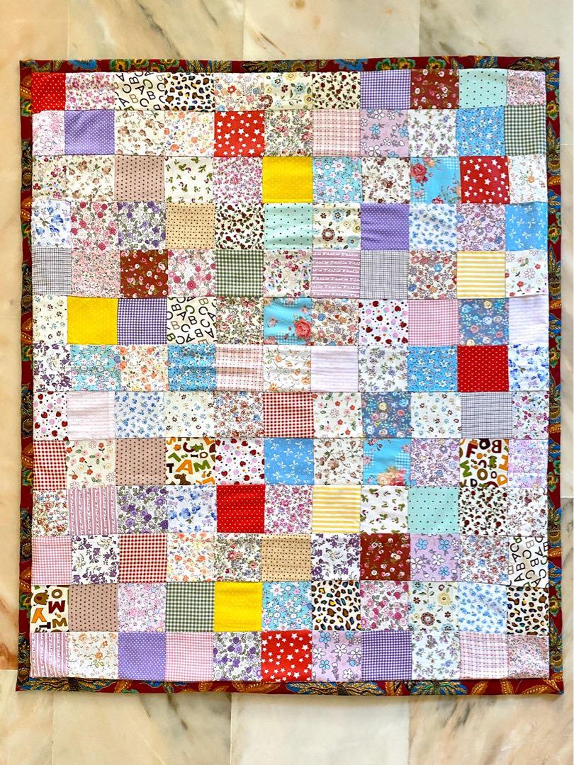 Handmade Patchwork Blanket (Category: Handmade Craft) located in Singapore. Submitted by klvn.q (Listing ID 270496403, Image 1). Description: * This item is sold. This is a customized order* Handmade patchwork quilt/ baby mat. perfect blanket for newborns or as gifts to your loved ones. Keeps your kid warm with polyester batting sewn in. 100% Cotten fabrics. Fabric will be assorted. This image is only a sample. Can be assorted arrangement or line