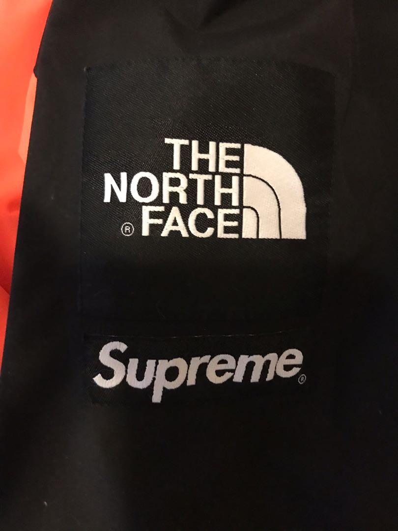 orange supreme north face jacket