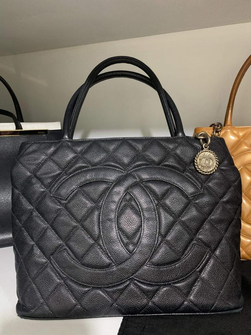 Authentic BLACK Chanel Medallion, CAVIAR. SILVER HARDWARE. (Category: Luxury Bags & Wallets) located in Pasig City. Submitted by candy_boxess (Listing ID 270895817, Image 1). Description: Authentic BLACK Chanel Medallion, CAVIAR. SILVER HARDWARE..