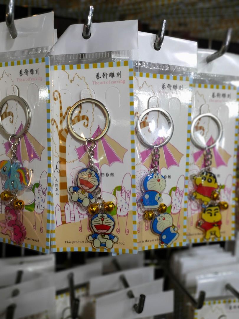 Key chains (Category: Everything Else) located in Singapore. Submitted by iilikeshopping (Listing ID 270868604, Image 3). Description: Key chain with 2 accessories Cute cartoons Avengers, Doraemon, Hello Kitty, tsum tsum, pony, Garfield, my Melody, Mickey.