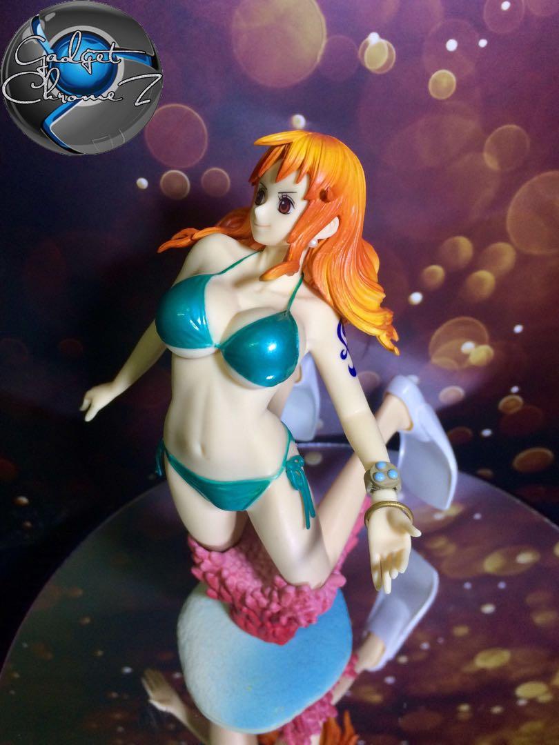 One Piece (Nami in Swimsuit) *AUTHENTIC (Category: Figurines & Statues) located in San Jose del Monte. Submitted by gadget_chromez (Listing ID 270855575, Image 2). Description: ONE PIECE - NAMI In Swimsuit 100% AUTHENTIC from JAPAN. LOOSE. WYSIWYG Mint Condition #GadgetChromez #GAMEZandTOYS.