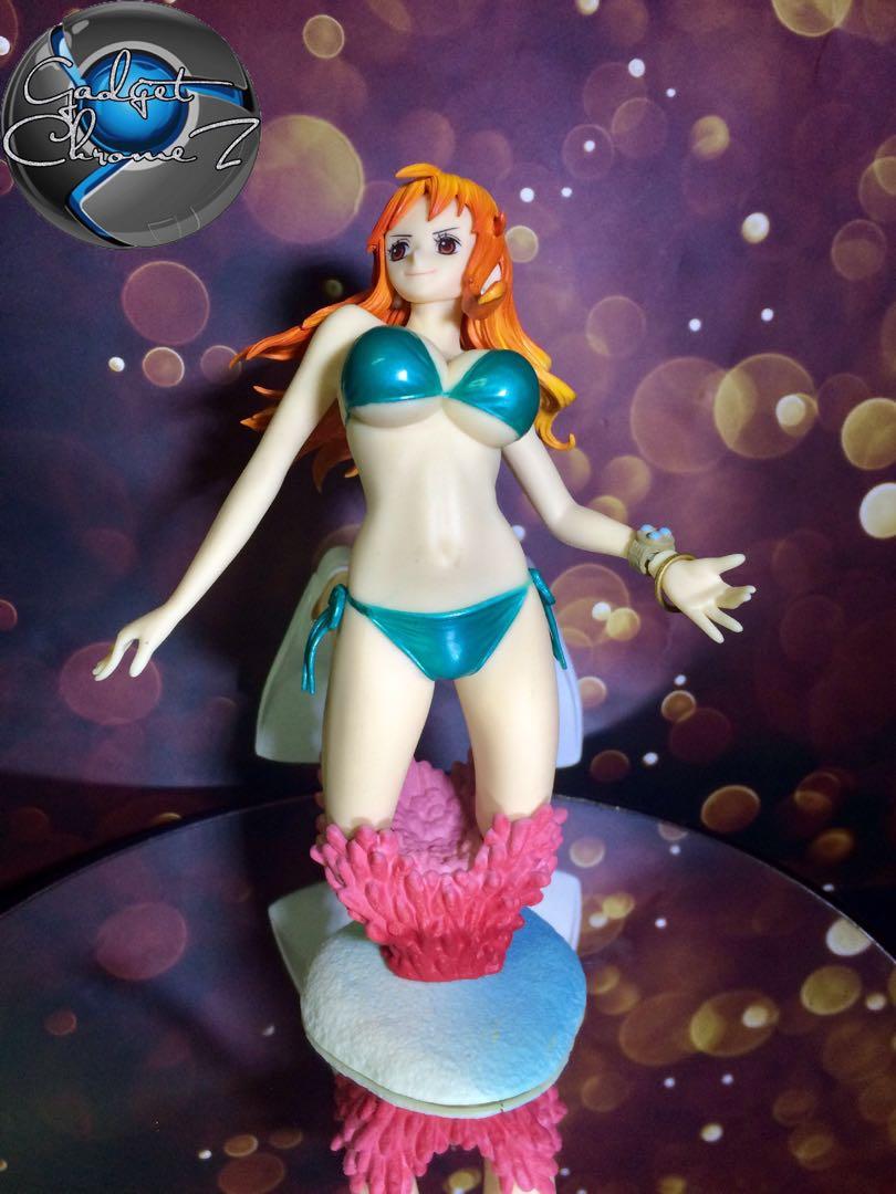 One Piece (Nami in Swimsuit) *AUTHENTIC (Category: Figurines & Statues) located in San Jose del Monte. Submitted by gadget_chromez (Listing ID 270855575, Image 1). Description: ONE PIECE - NAMI In Swimsuit 100% AUTHENTIC from JAPAN. LOOSE. WYSIWYG Mint Condition #GadgetChromez #GAMEZandTOYS.