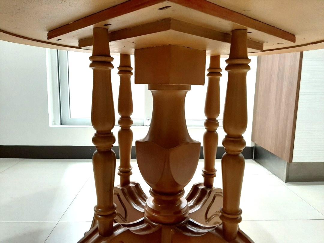 Coffee table / small dining table / study table (Category: Tables & Sets) located in Quezon City. Submitted by maki1505 (Listing ID 270989709, Image 2). Description: Solid wood Recently repainted No scratches Intricate design Very sturdy Can be used as your morning coffee table or dining table or as your children's study Dimensions Height 29inches Diameter 36inches.