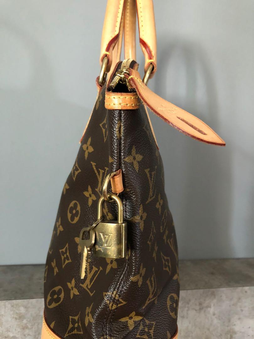 Louis Vuitton Lockit Handbag 362824