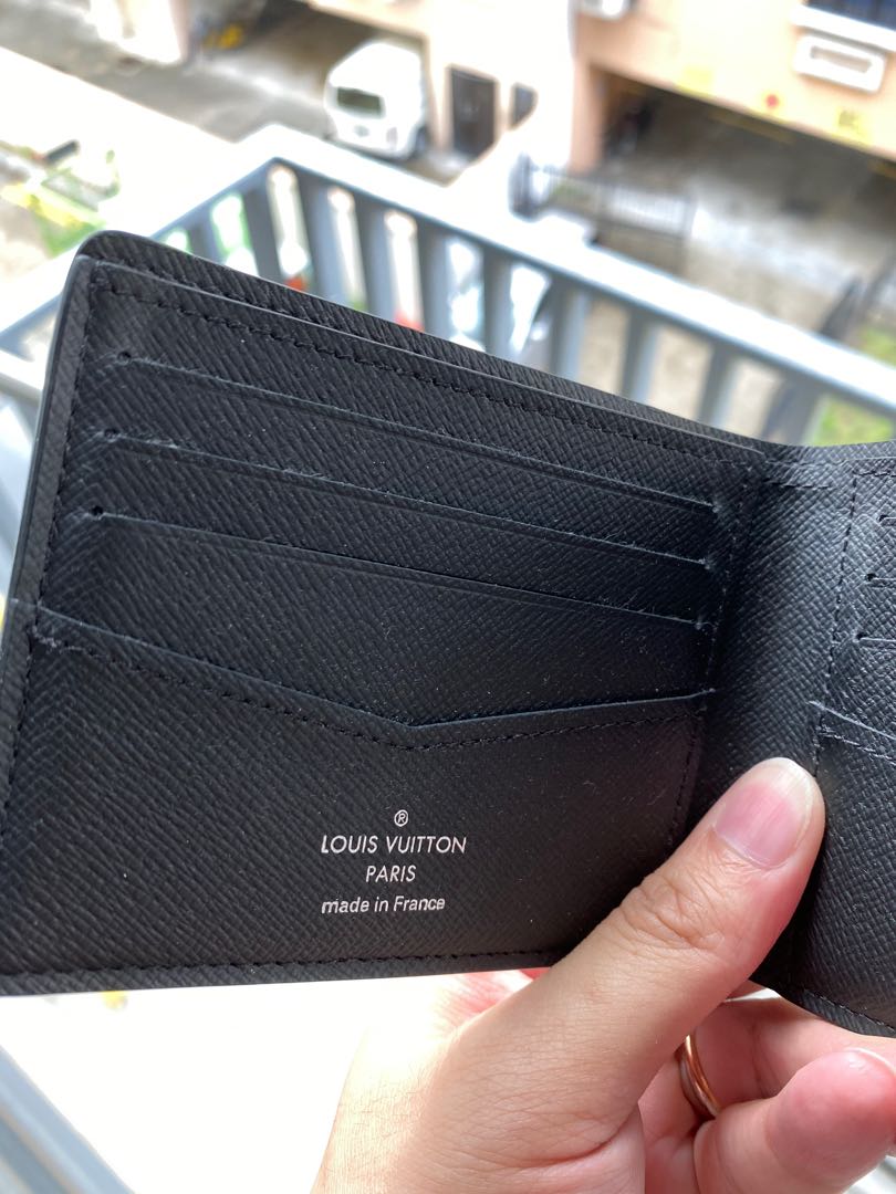 Louis Vuitton full leather slender wallet M60339 (Black), Luxury, Bags &  Wallets on Carousell