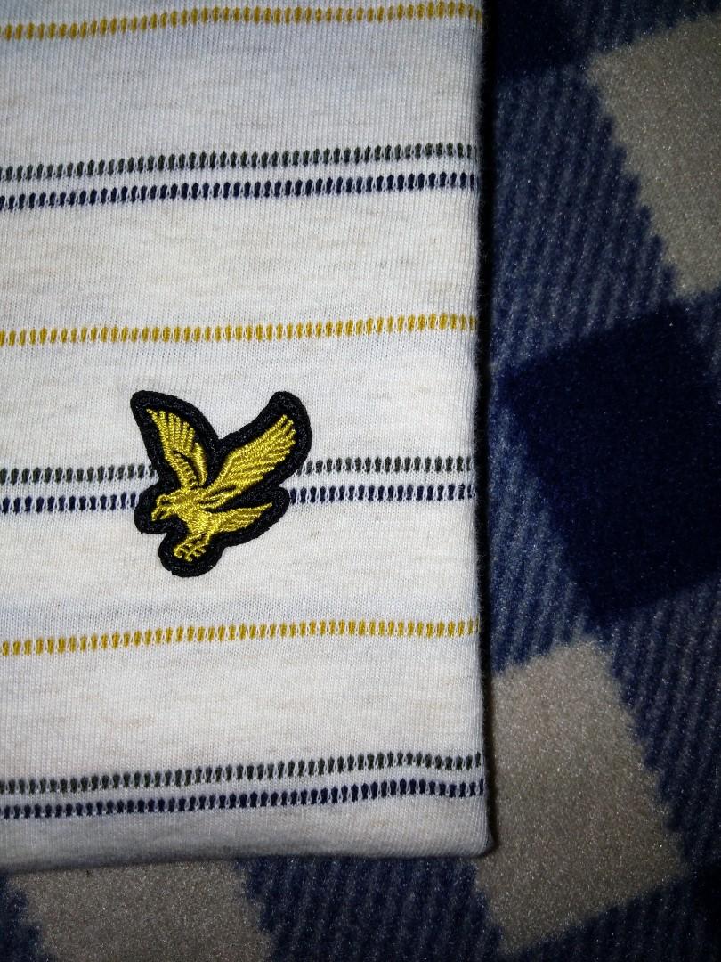 Lyle and Scott Y2K Tee Shirt (Category: Tshirts & Polo Shirts ) located in Manila. Submitted by ukayph (Listing ID 271051656, Image 2). Description: Lyle and Scott Y2K Canary, Flaxen, Blue and Green striped embroidered logo Tee shirt! 🌱 Great condition, very cute and classic, can fit to Small and Medium Sizes! Very cool and beautiful! For only 300 pesos! ❣️.