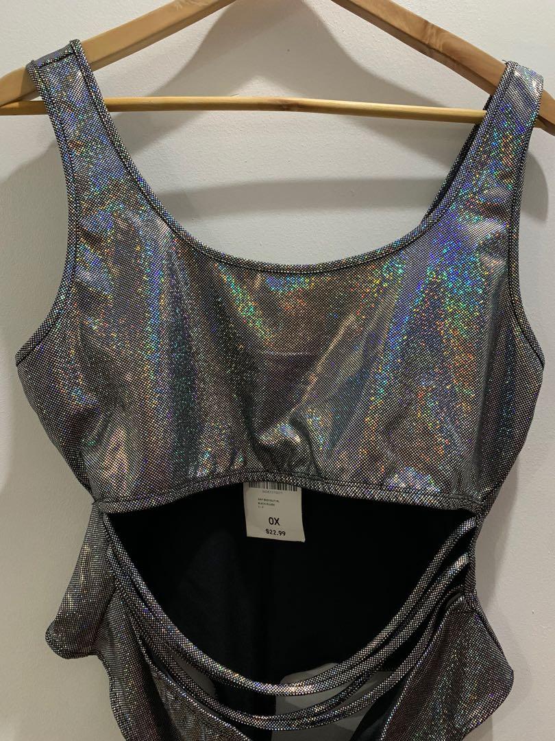 Forever 21 Iridescent Bodysuit (Category: Sleeveless) located in Taguig. Submitted by impulsivemoims (Listing ID 271236211, Image 3). Description: Authentic Forever 21 Iridescent Bodysuit PLUS SIZE Knit bodysuit featuring an iridescent design, scoop neck, strappy midriff cutout and a thong bottom. Size: 0X (fits L-XXL Color: Black/Silver Condition: 10/10 BRAND NEW WITH TAGS Super cool Rave/Edgy look 😍😍😍 RFS: Doesn’t fit Original Price: 1100 pl