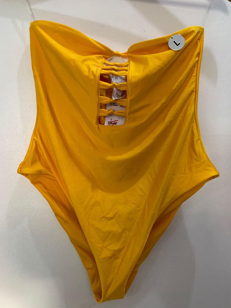 Forever 21 One Piece Swimsuit (Category: Bikinis & Swimsuits) located in Taguig. Submitted by impulsivemoims (Listing ID 271192188, Image 2). Description: Authentic Forever 21 Cutout One-Piece Swimsuit Size: L Color: Yellow Gold Condition: 10/10 brand new with tags Very cute in person 😍😍😍 RFS: doesn’t fit Original Price: around 1400 (plus taxes) ✅Discounts for multiple orders .