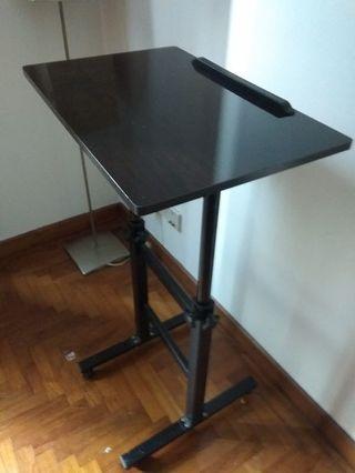 Adjustable standing table