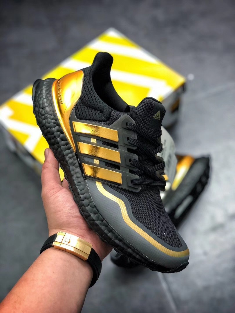 Ultraboost black and gold sales