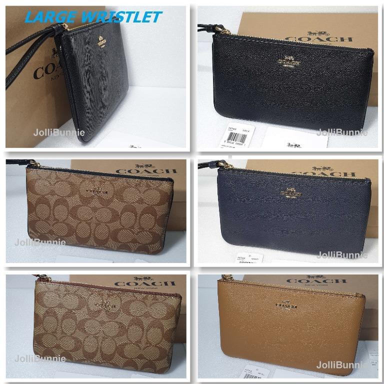 coach pouch wallet price